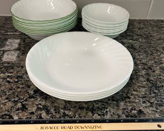 H98 - $50. Vintage Corelle Bowl 16 Piece Set. 4 - 8.5" bowls. 6 -7" bowls, and 6 - 5.5" green rimmed bowls.