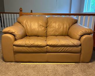H59 - $150. Tan Leather Loveseat by Palliser Furniture "Shanelle Classic".Worn but no holes/rips. Measures 64” W x 36” D x floor to seat 18” x floor to back 30” Tall.