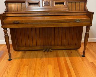 H46 - $100. Baldwin Upright Piano. Serial #1196036. Made In The USA. Measures 59” W x 29” D x 40” Tall. YOU MUST HIRE MOVERS. Located on the first floor - about 20' into the house.