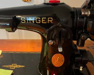 H79 - $75. SINGER 201-2 Sewing Machine. Works. Table Measures 25.5” W x 17.75” D x 30.25” Tall.