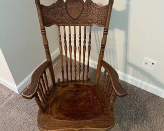 H61 - $65. Antique Rocking Chair with leather seat. Measures 25” W x 30“ D x floor to seat 16” x floor to back 38.5“ Tall.