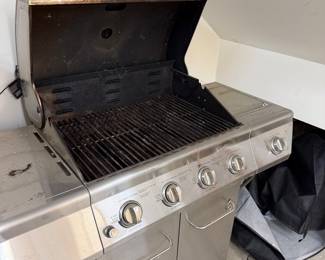 H109 - $150. Nexgrill 4 Burner with Cover and Propane Tank.