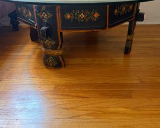 vintage Chinoiserie octagonal black lacquer coffee table featuring a protective glass top