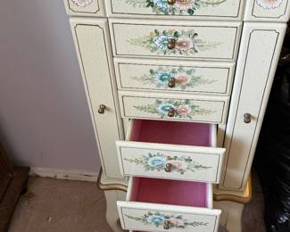 traditional off-white hand-painted floral jewelry armoire featuring a flip-top mirror