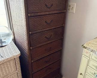 vintage dark brown woven rattan tallboy chest of drawers featuring stacked drawers