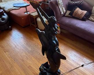 Tiffany-style stained glass floor lamp featuring a sculptural figure of a woman riding a dolphin, topped with a colorful mosaic bowl shade 4Ft tall
