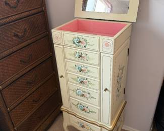 traditional off-white hand-painted floral jewelry armoire featuring a flip-top mirror