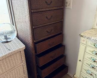 vintage dark brown woven rattan tallboy chest of drawers featuring stacked drawers