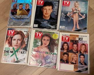 Assorted TV guides kept in sleeves like new 