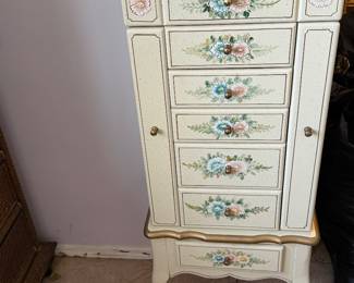 traditional off-white hand-painted floral jewelry armoire featuring a flip-top mirror