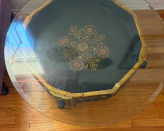 vintage Chinoiserie octagonal black lacquer coffee table featuring a protective glass top