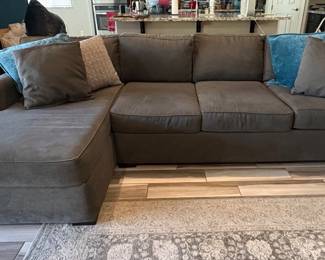 Living Spaces 9.5 feet long, 5 feet wide.