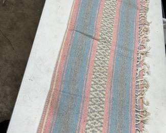 Long folded Native American rugs