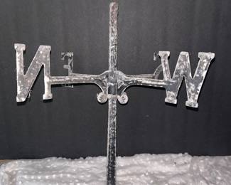 Cast metal weathervane
