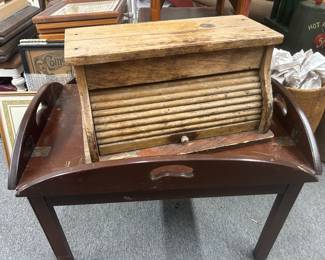 Wooden table in vintage roll top bread box