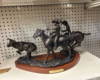 Cowboy two step metal cast statue