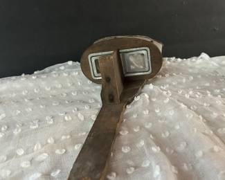 antique hand-held stereoscope viewer