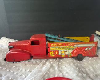 vintage pressed steel toy fire truck, manufactured by Wyandotte Toys