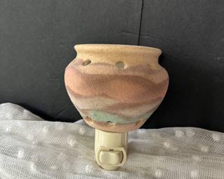 Native American pottery wall light