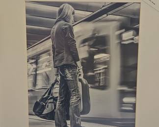 Passenger Patiently Waits for the Metro by Philip M. Shaw