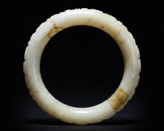 Carved White Jadeite Bangle with Archaistic Motifs and Repair