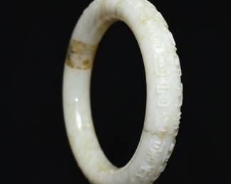 Carved White Jadeite Bangle with Archaistic Motifs and Repair