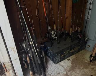 Collection of Assorted Fishing Rods and Reels