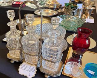 Antique decanters w/silver plate caddy