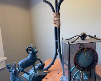 Rustic tabletop treasures featuring a sculptural ram lamp and a distinctive glass-cased mantel clock perfect statement pieces for a ranch or lodge-inspired home! ✨