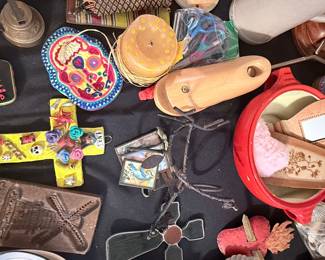Eclectic collection of colorful folk-art treasures, including sugar-skull décor, decorative crosses, small mirrors, ornaments, and unique handcrafted trinkets! 💀🌸✨
