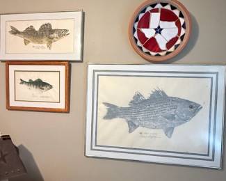 Collection of framed fish artwork paired with a colorful nautical wall accent perfect for a coastal home, fishing cabin, or seafood lover’s space! 🎣🐟