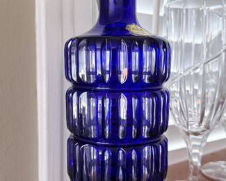 Striking Empoli-style cobalt-blue glass decanter with a bold stacked-ring design and sparkling clear crystal stopper a gorgeous statement piece for any barware collection! 💙✨