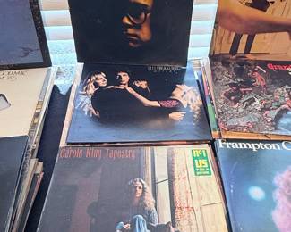 Elton John and Carole King vinyl records