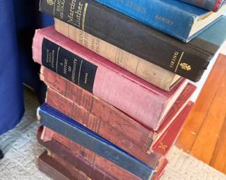 Stack of antique cloth-bound books