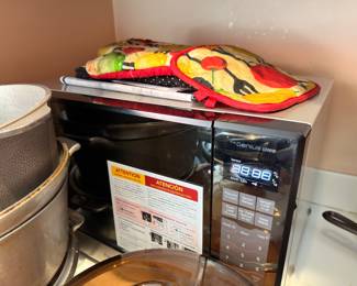 Microwave, cookware and pot holders