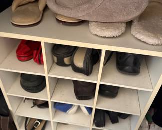 Rack of sweaters, robes and casual clothing