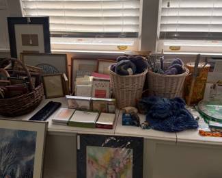 Yarn baskets, framed art and craft supplies