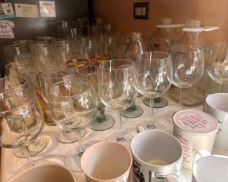 Large collection of wine glasses and stemware