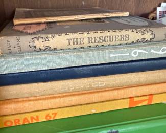 Vintage yearbooks and The Rescuers book