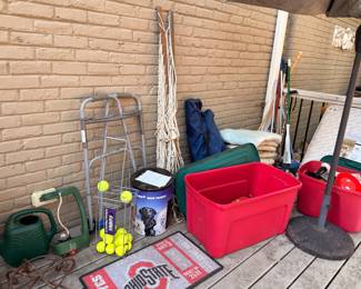 Garden tools, watering can and Ohio State mat