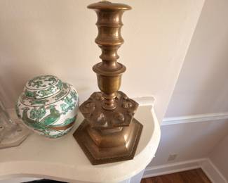 Brass candlestick and green Chinese ginger jar