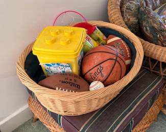 Basket of sports balls and outdoor toys