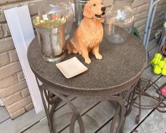 Golden retriever garden statue and hurricane lanterns