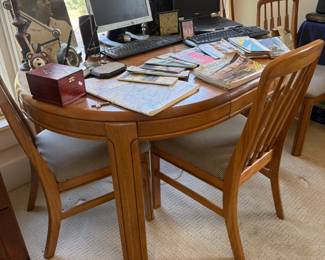 Wood desk table with chairs and office setup