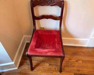 Antique carved rose-back side chair with velvet seat
