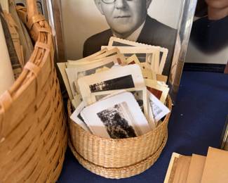 Basket of vintage black and white photographs