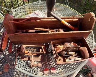 Antique wood carpenter's toolbox with vintage hand tools