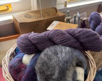 Basket of wool yarn skeins