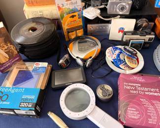 Vintage cameras, film reels and small electronics