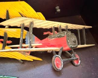 Antique wood model biplane, yellow and red